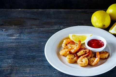 Roasted prawns with sauce Stock Photos