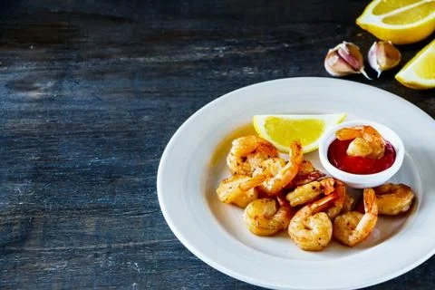 Roasted prawns with sauce Stock Photos