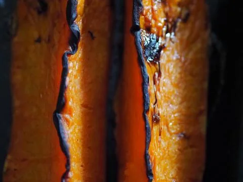 Roasted pumpkin with addition aromatic herbs Foto stock