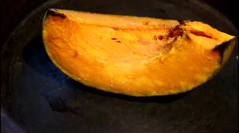 Roasted pumpkin in plate - top view Video stock 68961026