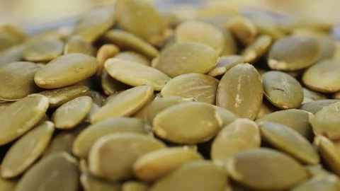 Roasted Pumpkin Seeds are a delicious, crunchy snack with hierro. Stock Footage 286359583