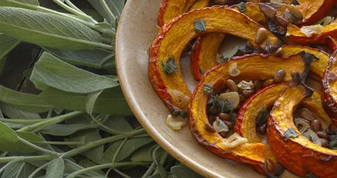 Roasted Red Kuri Squash with sage. Stock Footage 308747623