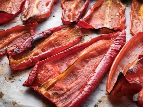 Roasted red peppers close up Stock Photos