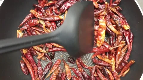 Roasted red peppers in a pan Stock Footage 131808747