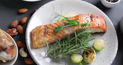Roasted salmon with vegetables. Top view Stock Footage 169946548