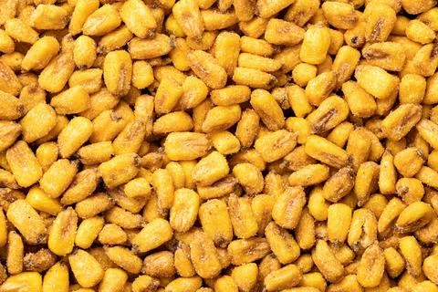 Roasted salted corn snack. Pattern of yellow corn seed. Roasted salted cor... Stock Photos