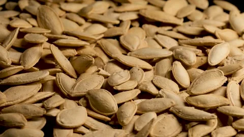 Roasted Salted Pumpkin Seeds Close Up Stock Footage 329968189