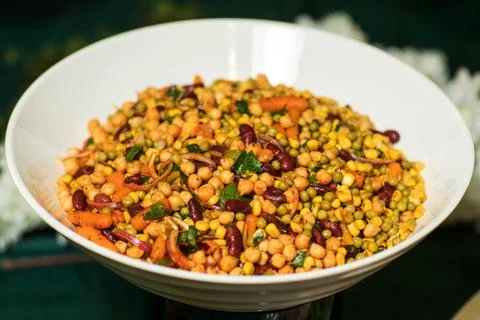 Roasted spicy chickpeas on rustic background Stock Photos