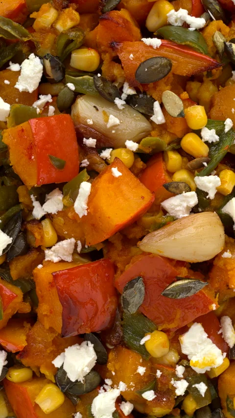 Roasted squash and green poblano pepper with feta salad. Vertical video. Stock Footage 282800991