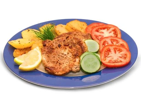 Roasted steak meat with vegetables Stock Photos