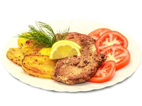 Roasted steak meat with vegetables Stock Photos