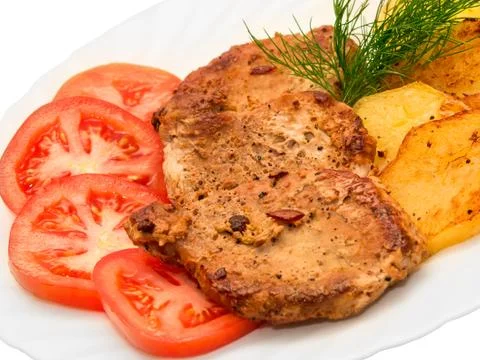 Roasted steak meat with vegetables Foto stock