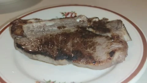 A roasted steak on the plate 動画素材 241691793