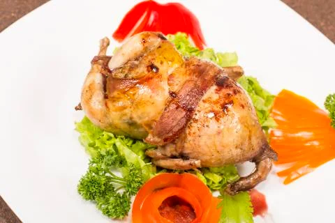 Roasted stuffed quail Stock Photos