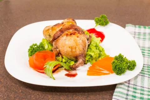 Roasted stuffed quail Stock Photos