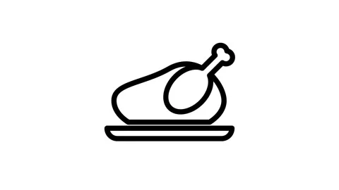 A roasted turkey on a white plate, accompanied by a silver knife resting be.. Stock Footage 334853192