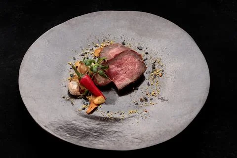 Roasted veal medium, with pepper and garlic Stock Photos