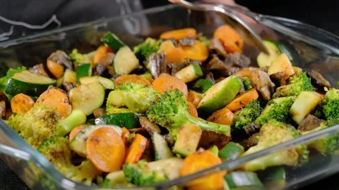 Roasted Vegetables and Meat in Glass Dish Cooking Stock Footage 341445896