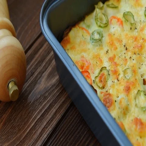 Roasted vegetables with cheese, egg and sour cream Stock Footage 69720026