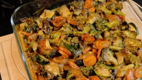 Roasted Vegetables in Glass Dish Cooking Scene Stock Footage 341445101
