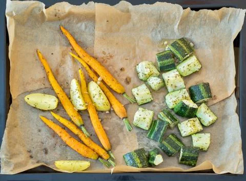 Roasted vegetables in a metallic baking dish Stock Photos