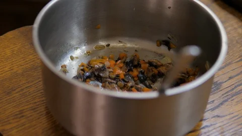 Roasted vegetables in a saucepan Stock Footage 119546716