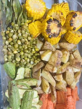Roasted Vegetables Tray with Corn Potatoes and Carrots Stock Photos