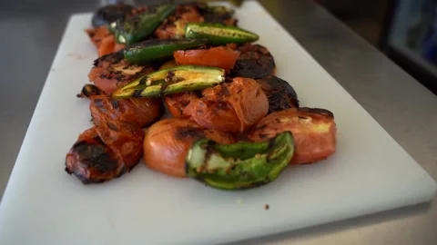 Roasted Veggies on Cutting Board Stock Footage 143166946
