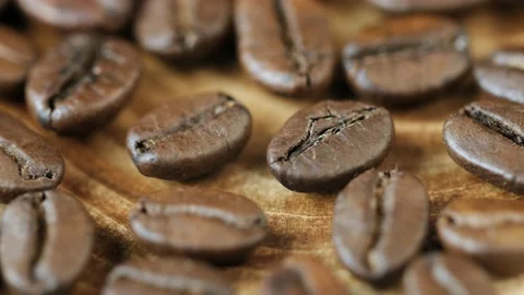 Roasted vietnamese coffee bean. Fragrant coffee beans scrolls slowly around the 스톡 동영상 153467581