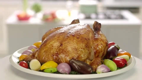 Roasted Whole Chicken with Vegetables on Rotating Turntable 4K 動画素材 344052387