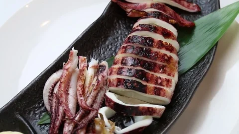 Roasted Whole Squid Stock Footage 82558772