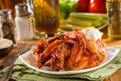 Roasted wings close-up Stock Photos