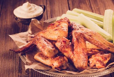 Roasted wings with sauce Stock Photos