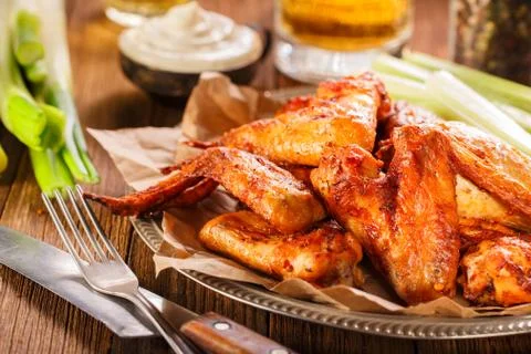 Roasted wings with sauce Stock Photos