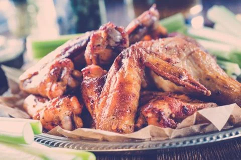Roasted wings with sauce Stock Photos