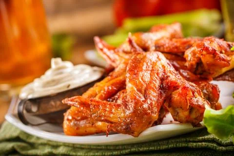 Roasted wings with sauce Stock Photos