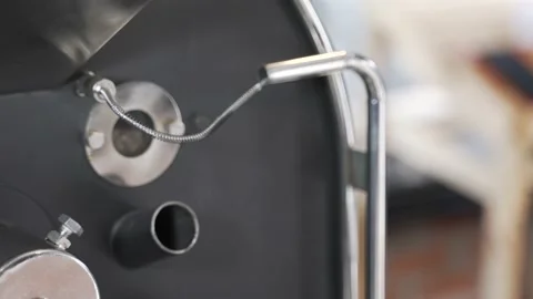 Roaster checking aroma and color of coffee Video stock 133125496