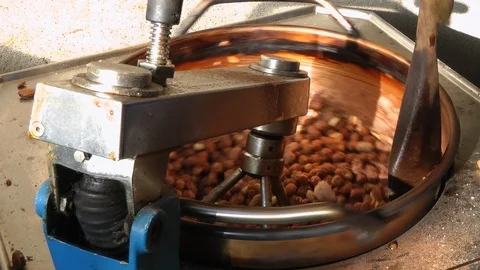 Roasting almonds in a machine Stock Footage 89961494