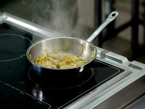 Roasting and cooking meat in a frying pan Stock Footage 71123662
