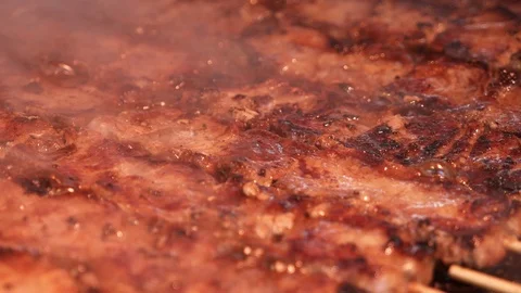 Roasting Beef meat on the grill. Stock Footage 117998863