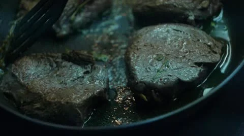 Roasting beef steak, close up Stock Footage 12752462