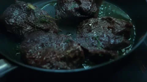 Roasting beef steak on pan, close up Stock Footage 12752501