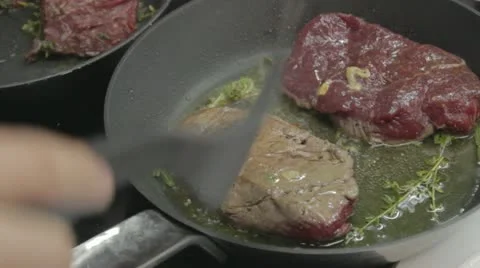 Roasting beef steaks Stock Footage 12752536