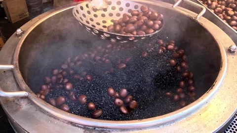 Roasting chestnuts2 Stock Footage 329160686