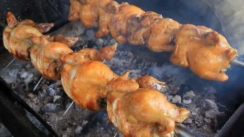 Roasting chicken Stock Footage 74484819