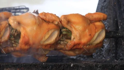 Roasting chicken Stock Footage 74484826