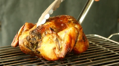 Roasting  chicken on grill Stock Footage 91657110