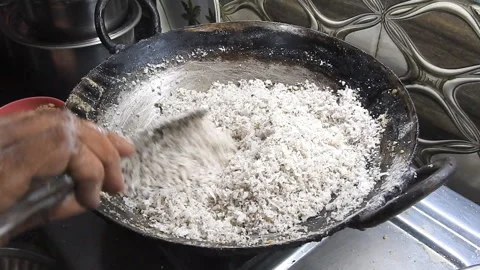 Roasting coconut flakes Stock Footage 194477892