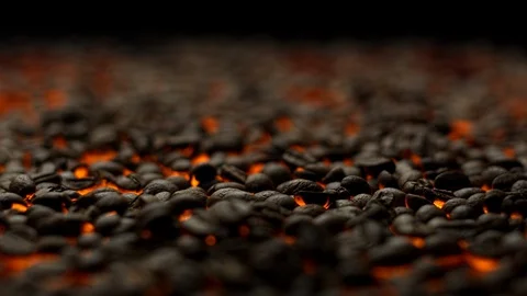 Roasting coffe beans falling dow in slow motion Stock Footage 129493541
