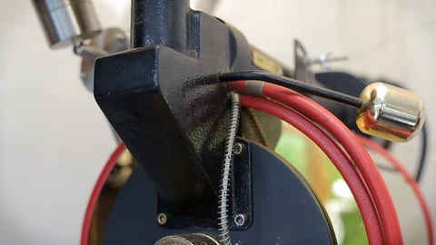 Roasting Coffee Beans. Green coffee beans in the roaster. Coffee beans in the Stock Footage 75826794